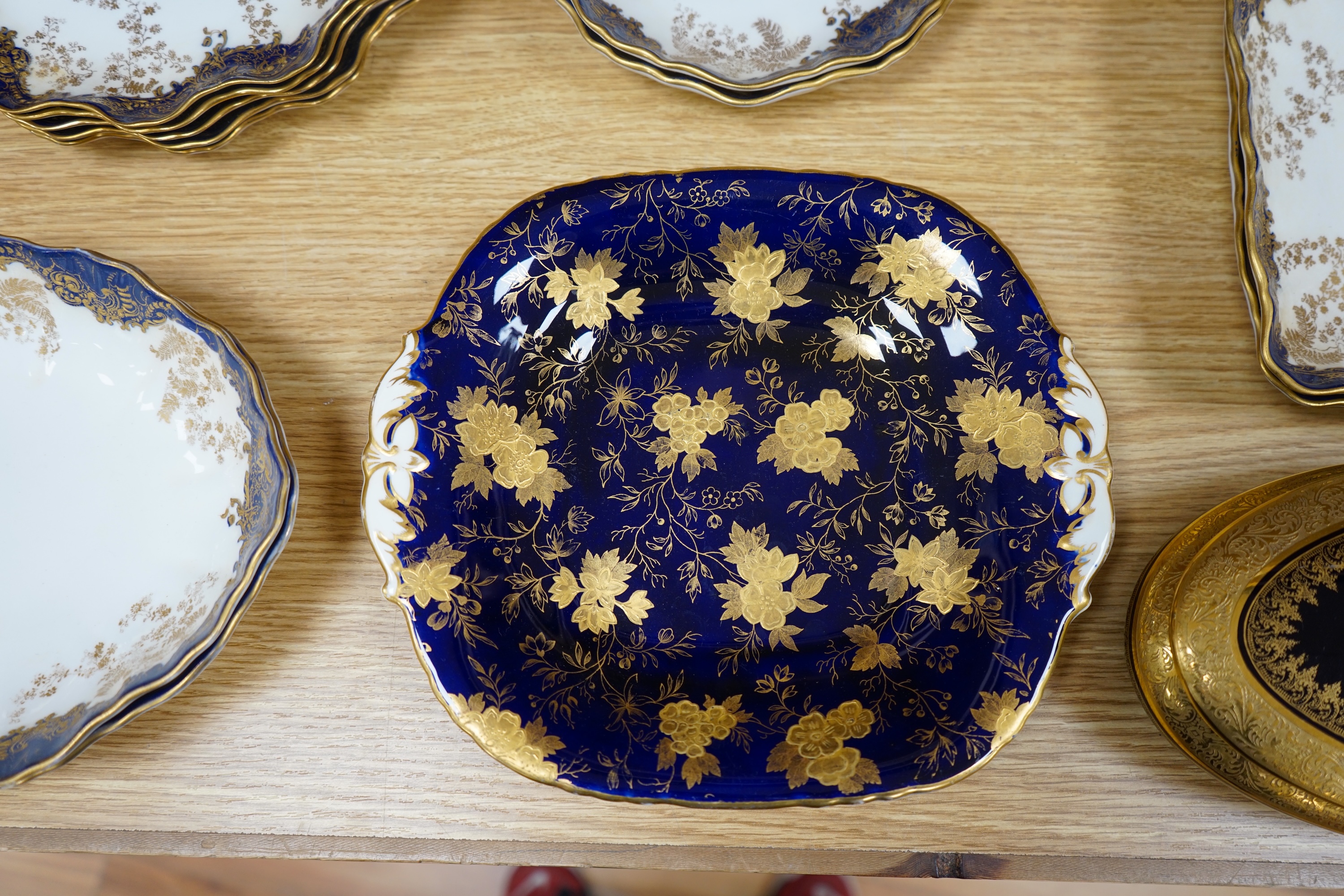 A collection of porcelain to include a Royal Doulton part dessert set, a Limoges gilt oval box and cover and a similar Davenport dish, largest 26cm wide. Condition - mostly fair